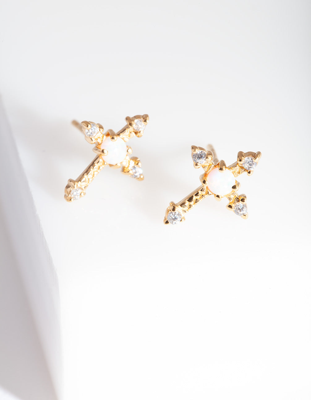 PLTD ST SG OPAL CROSS STUD ER@