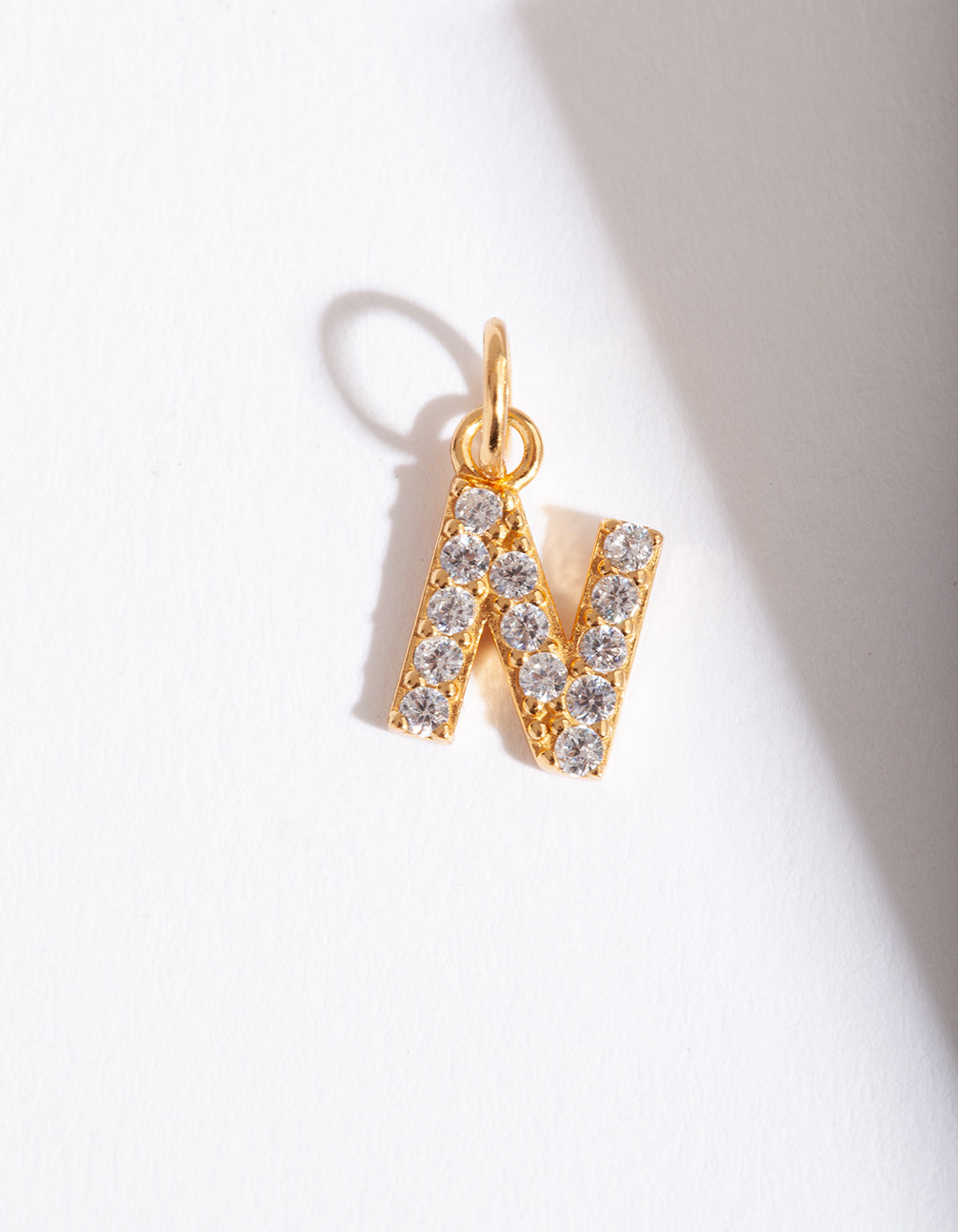 PLTD ST SG CZ LETTER N CHARM