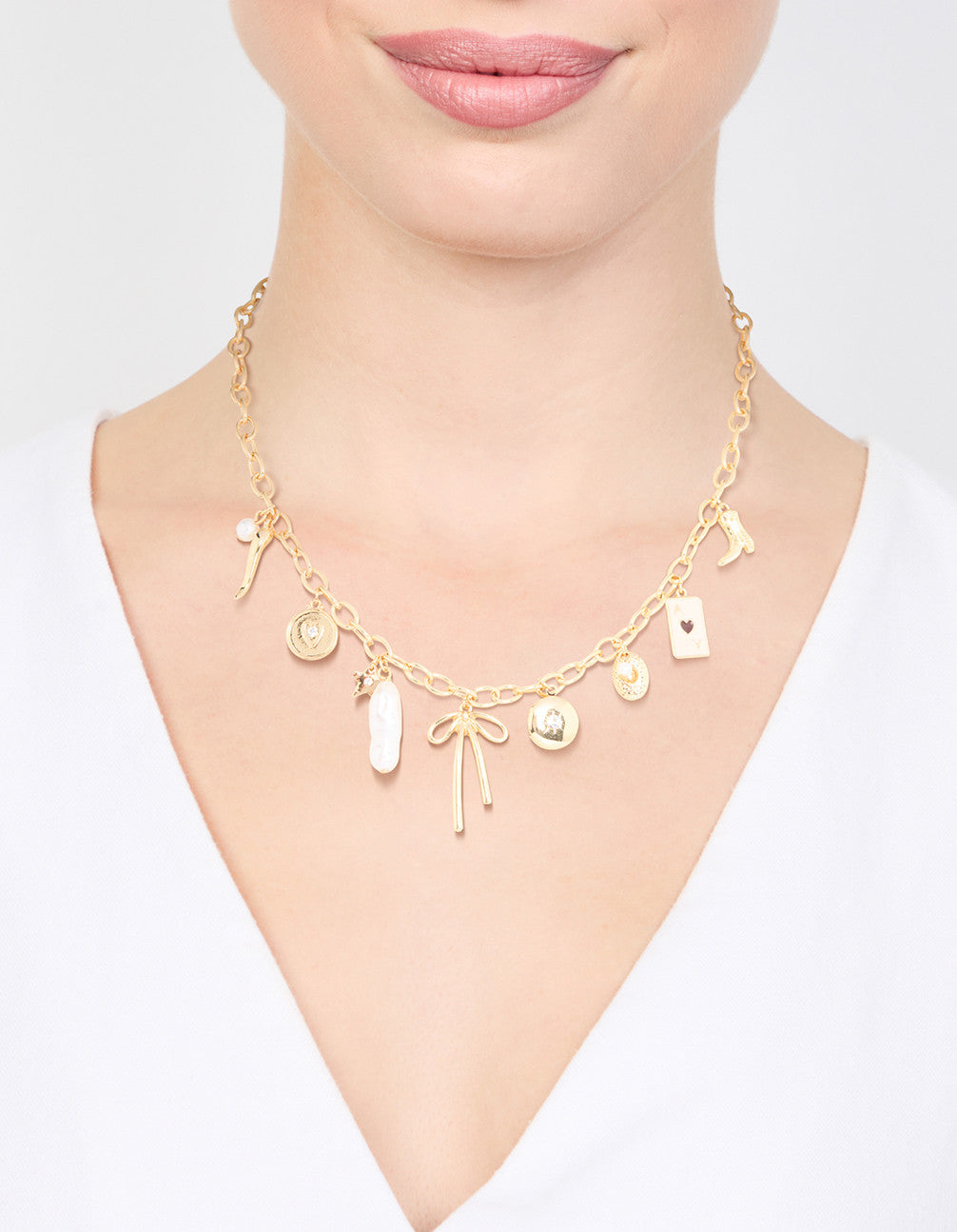 Gold Plated Bow & Star Charm Necklace
