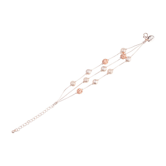 PEACH AND GOLD MULTI TEXTURED BEAD STATION BRACELET