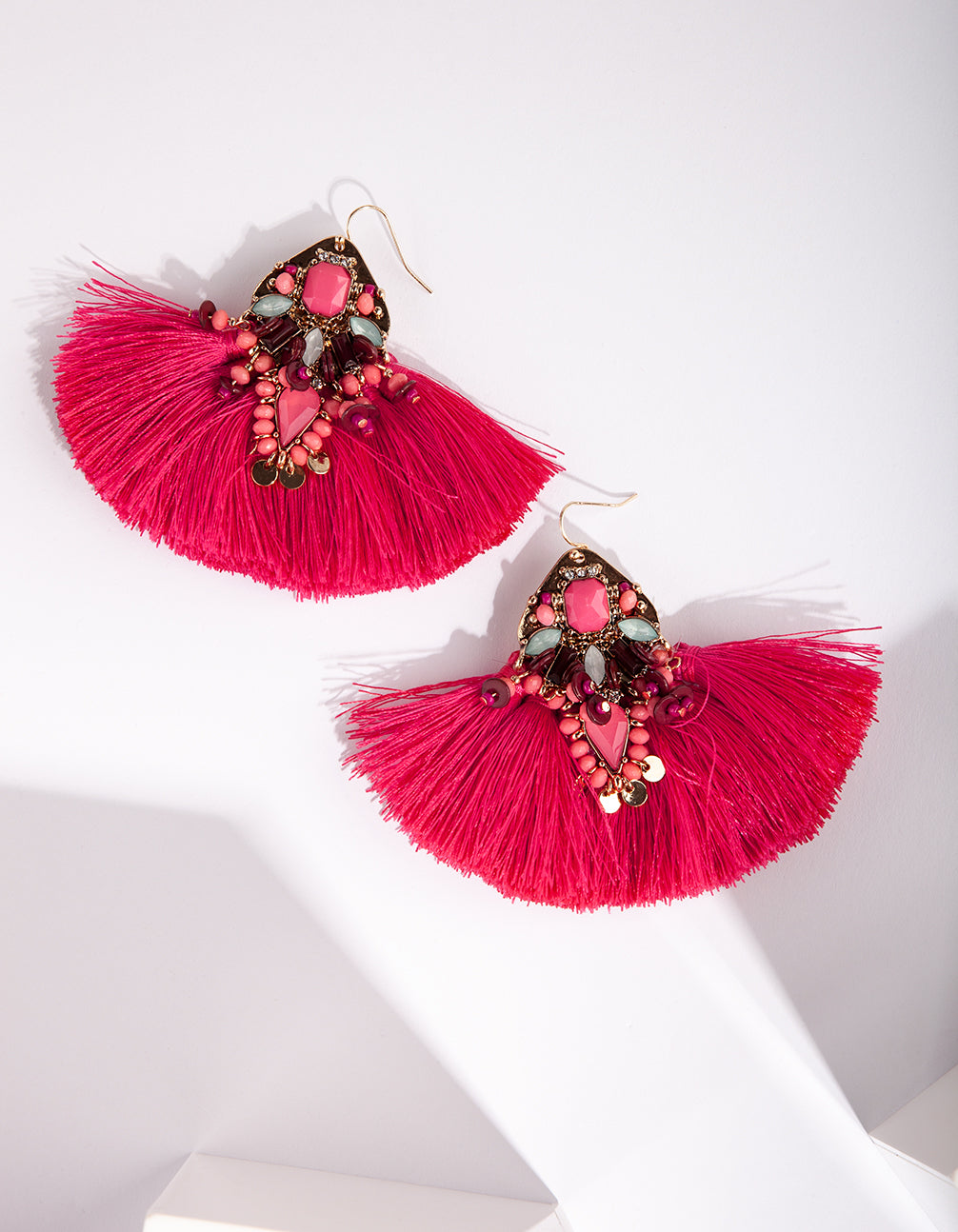 MULTICOLOUR BEADED SHIELD DROP WITH FUSCHIA FANNED TASSEL