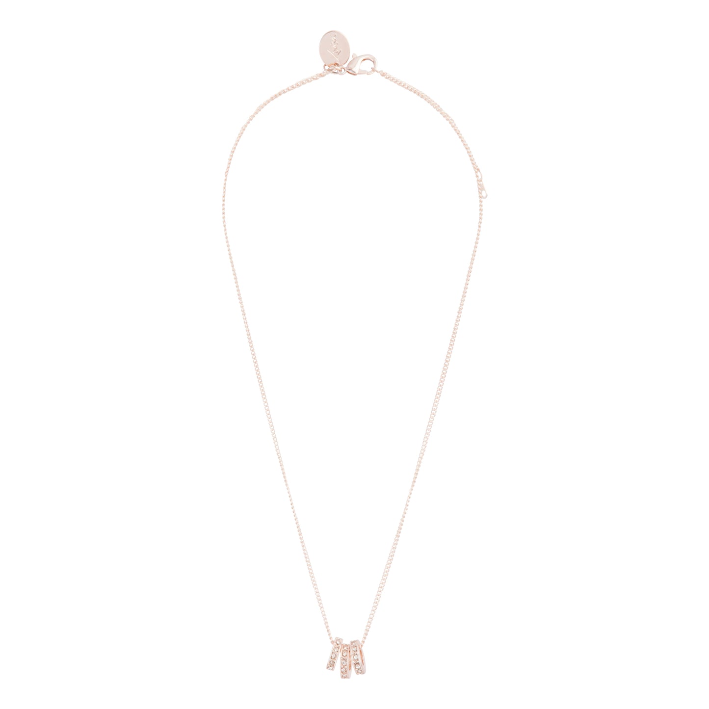 ROSE GOLD TRIO OF DIAMANTE RINGS ON SHORT FINE NECKLACE