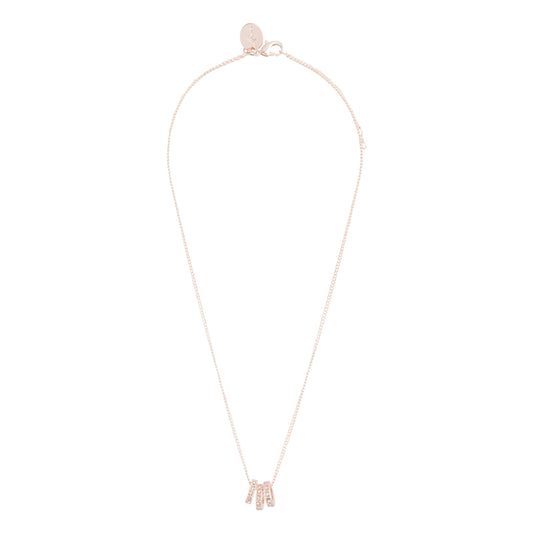 ROSE GOLD TRIO OF DIAMANTE RINGS ON SHORT FINE NECKLACE