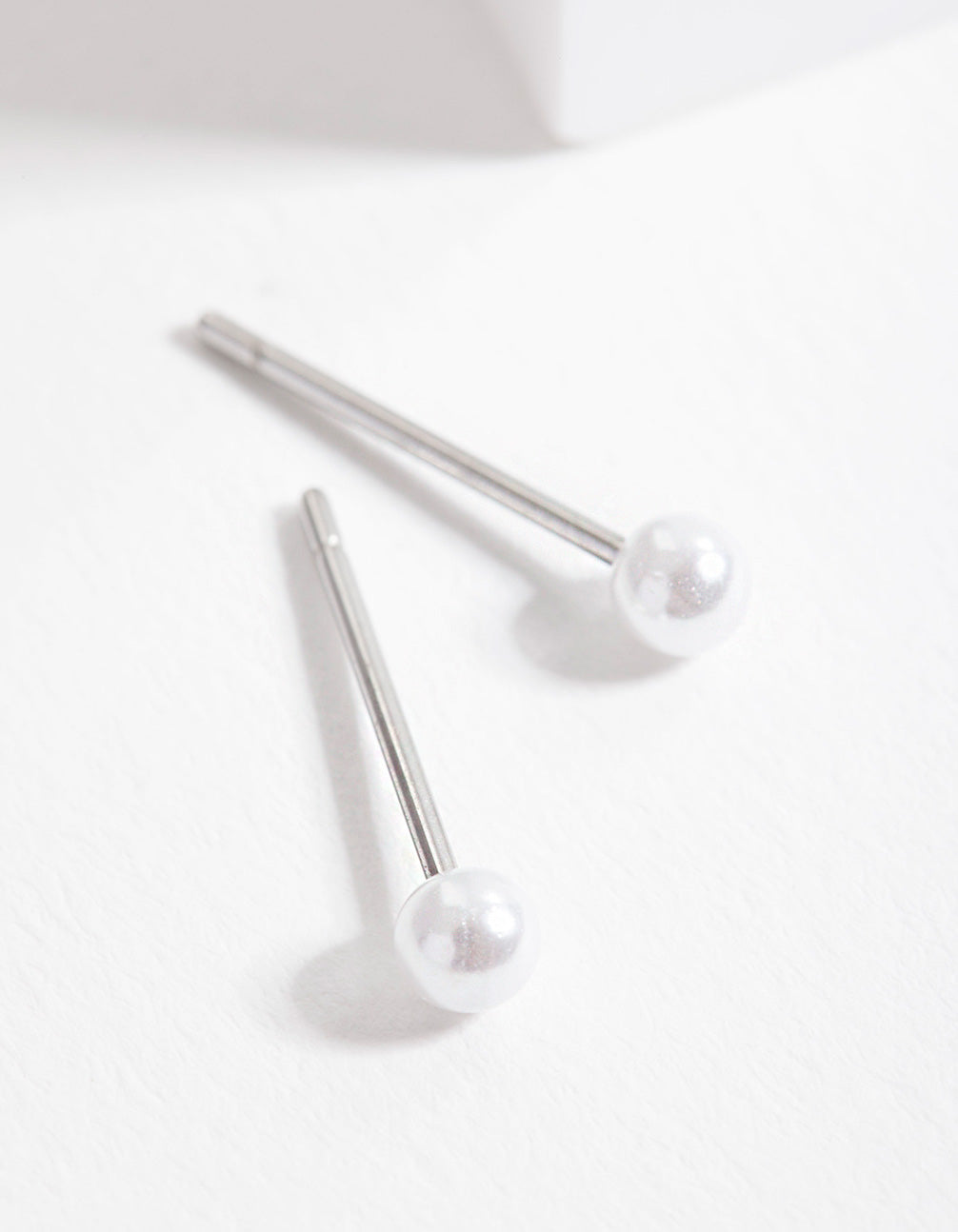 8STD BD TINY PEARL EAR STUD
