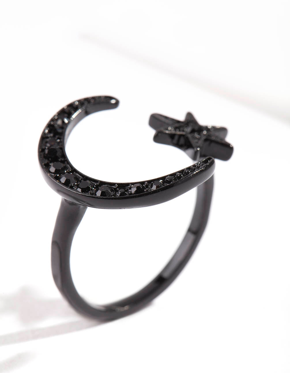 BLACK STAR AND MOON OPEN BAND RING