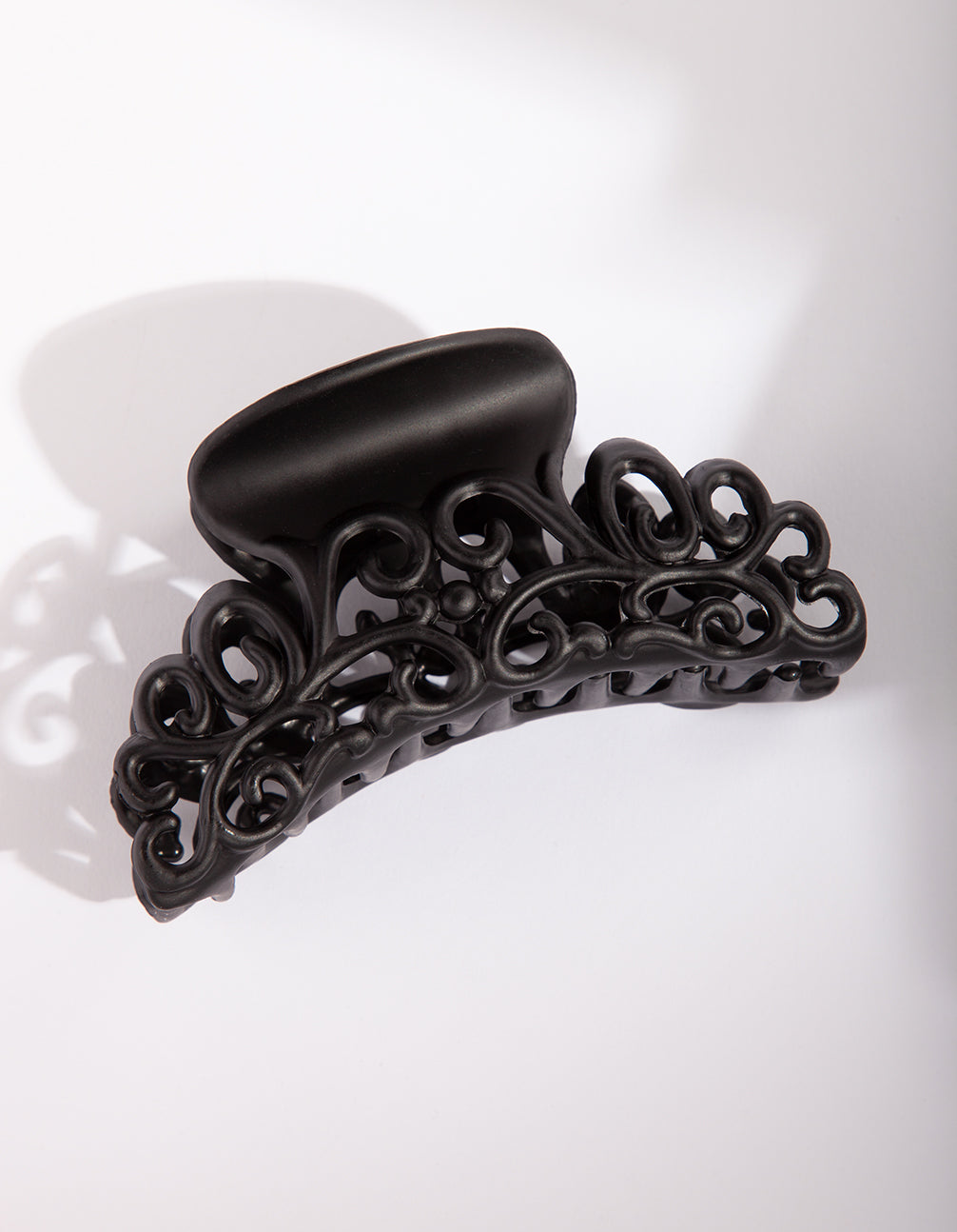 POS PL SWIRL BLK 9CM CLAW